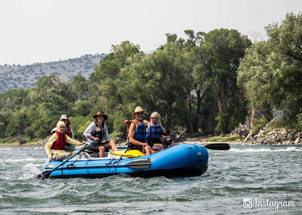 mikayla_guiding_the_raft